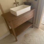 oak vanity with white sink